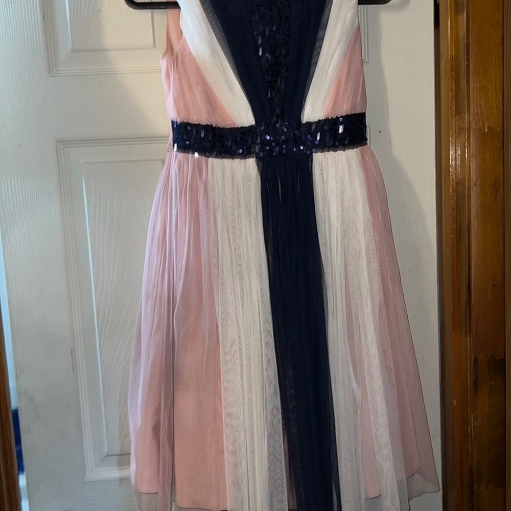 A girls 14 blue, white, and pink dress